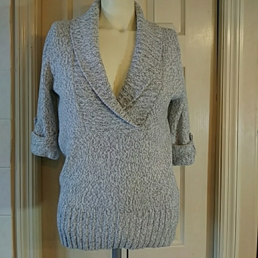 A grey soft knitted sweater